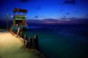 Belize, Caye Caulker - Sunset and Rasta Boat at the Split.JPG