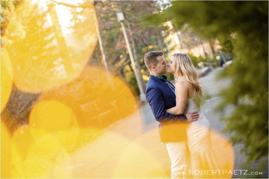 University of Washington Wedding Photography Engagement session in the late afternoon light during springtime and cherry blossom season. 