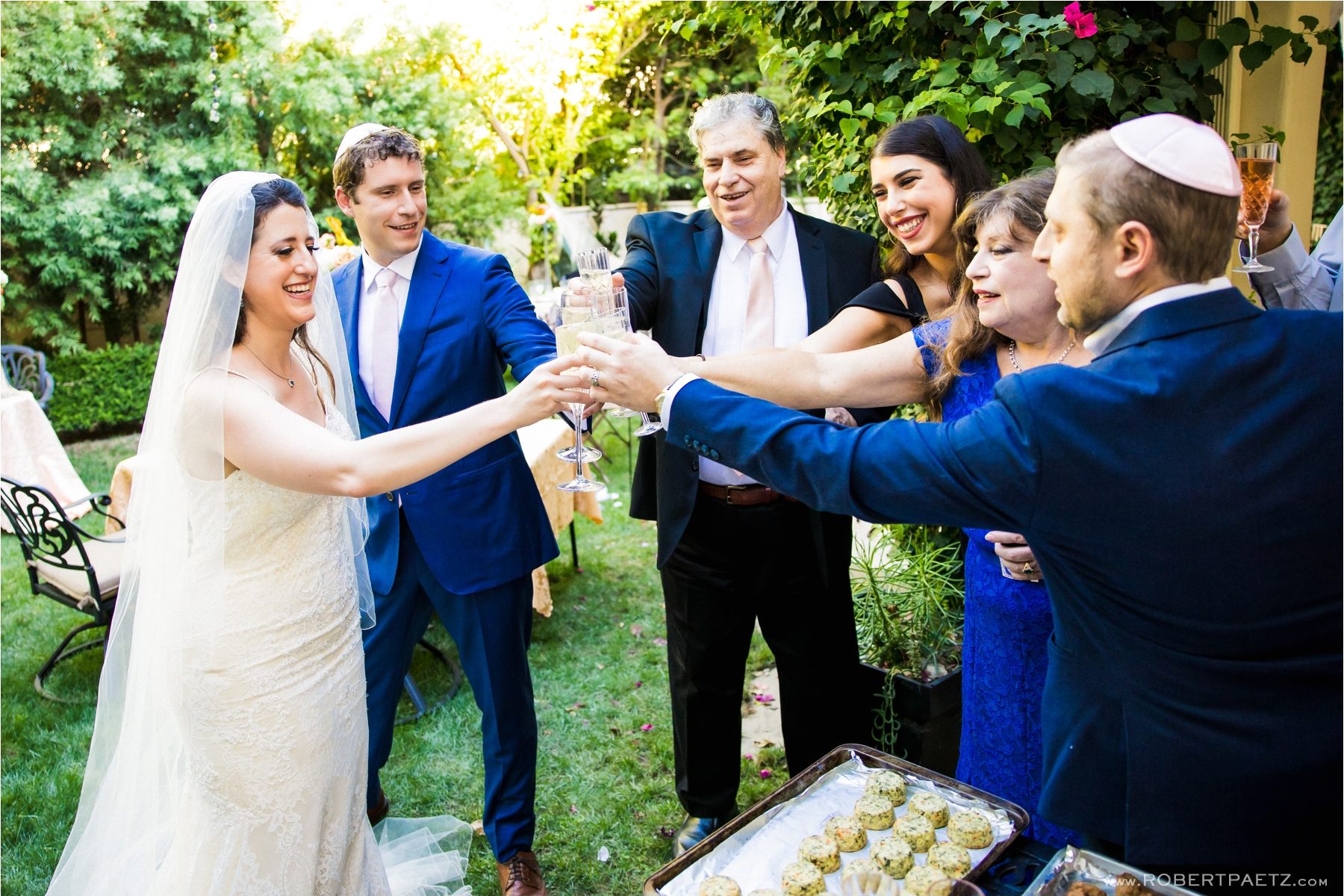 A backyard, social distanced, Zoom wedding in Los Angeles, California, during the Covid-19 pandemic photographed by the destination wedding photographer, Robert Paetz.