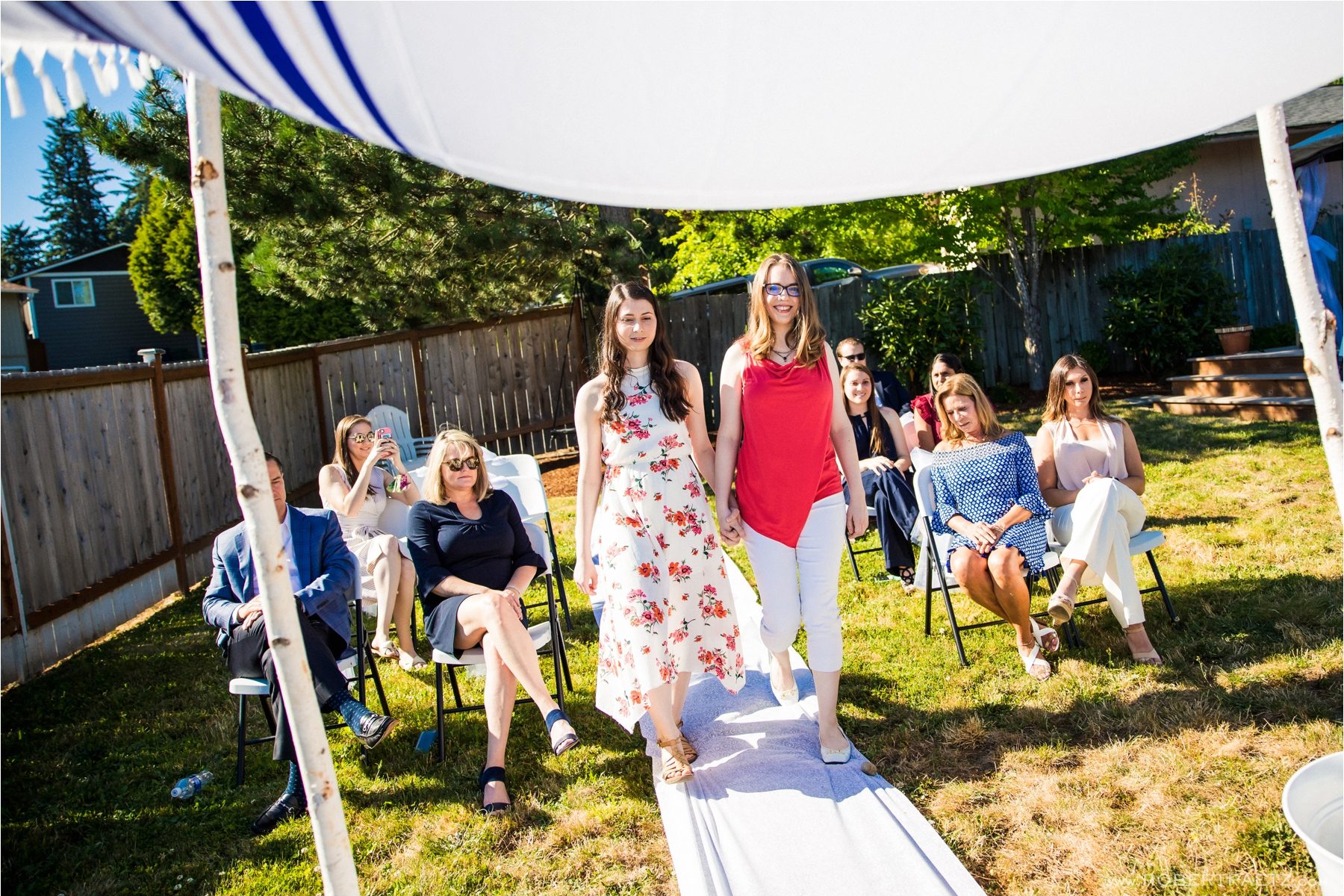 A backyard, social distanced, Zoom wedding in Kirkland Seattle, Washington, during the Covid-19 pandemic photographed by the destination wedding photographer, Robert Paetz.